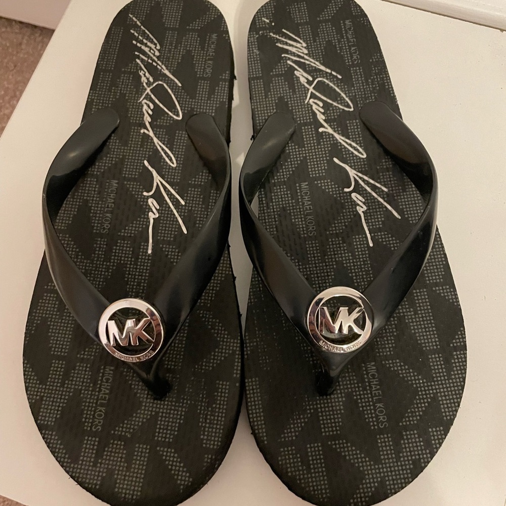 Michael Kors Flip Flops. Size 7.